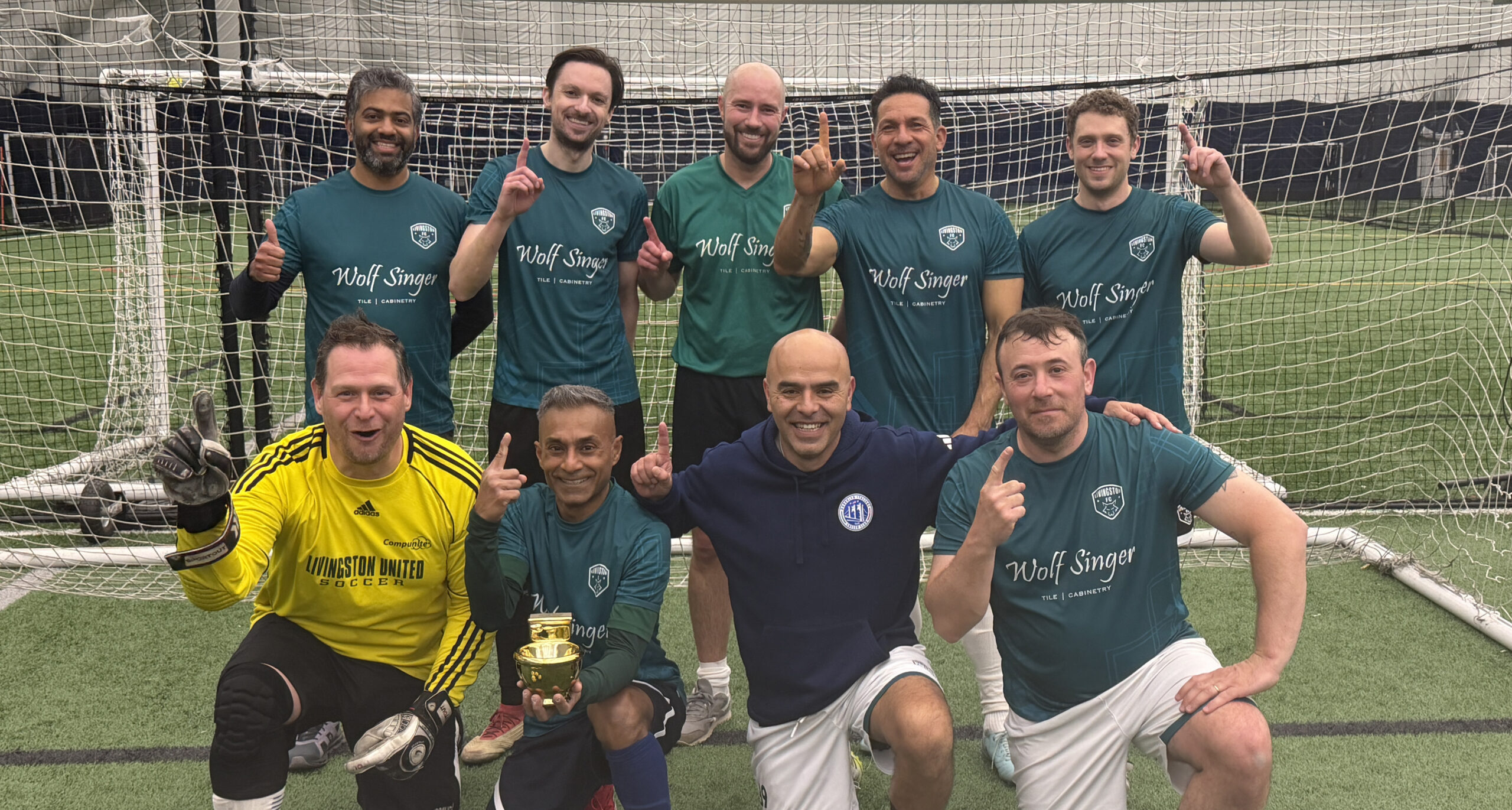 Top row: Abraham Mohan, Mark Ingle, Brian Downs, Joe Freyre, Ian Tarbert. Bottom row: Adam Phelps, Partha Bhattacharyya, Wilson Valencia, John Piccolo. Not Shown: Zev Svirsky, Shaun Oliver, Carlos Alves.